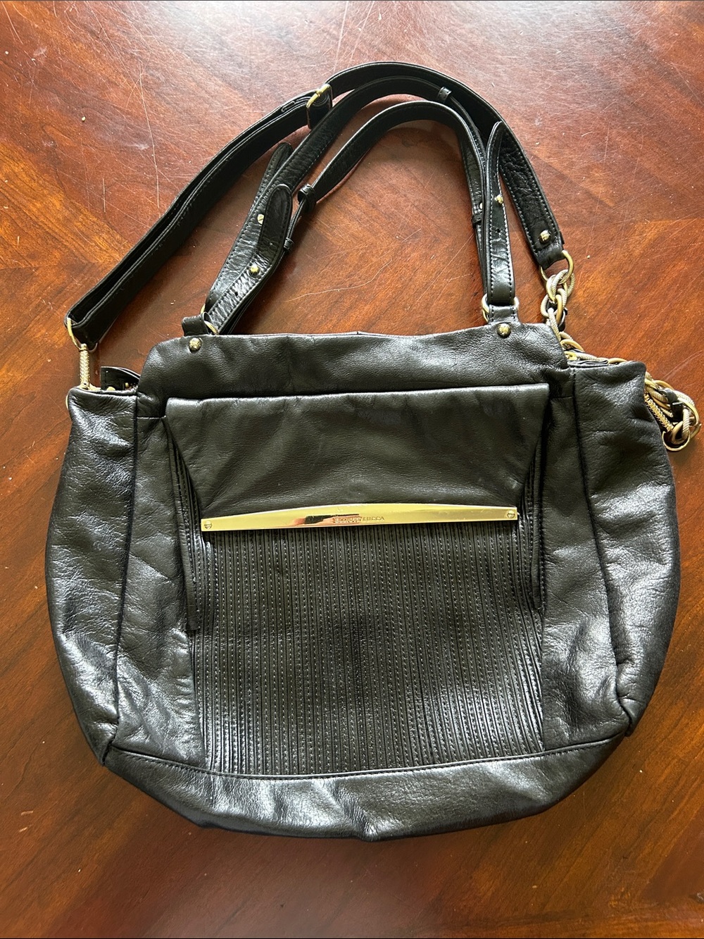 Elliott Lucca Black Leather Tote with Gold Accent Bar